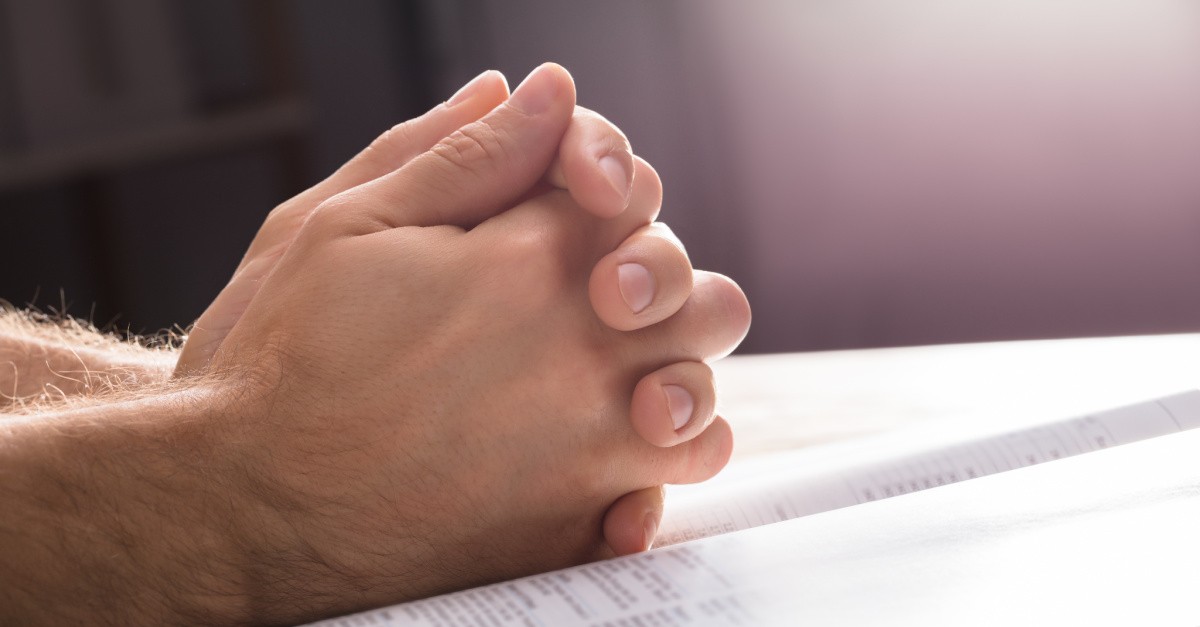 Praying hands, football coach is denied right to pray after games