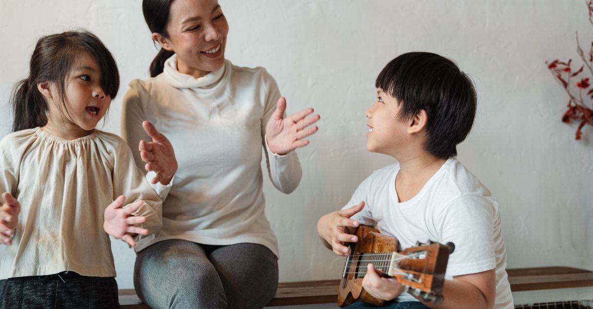 Mom and children singing