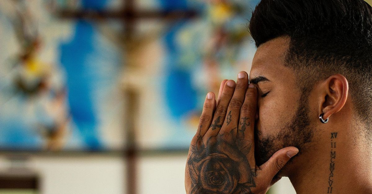 Man Praying in Church; Prayers for Peace That Will Calm Your Heart Today